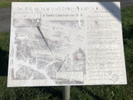 Stèle rappelant l’emplacement de l’aérodrome E1 à St Laurent sur Mer (France – Calvados)
